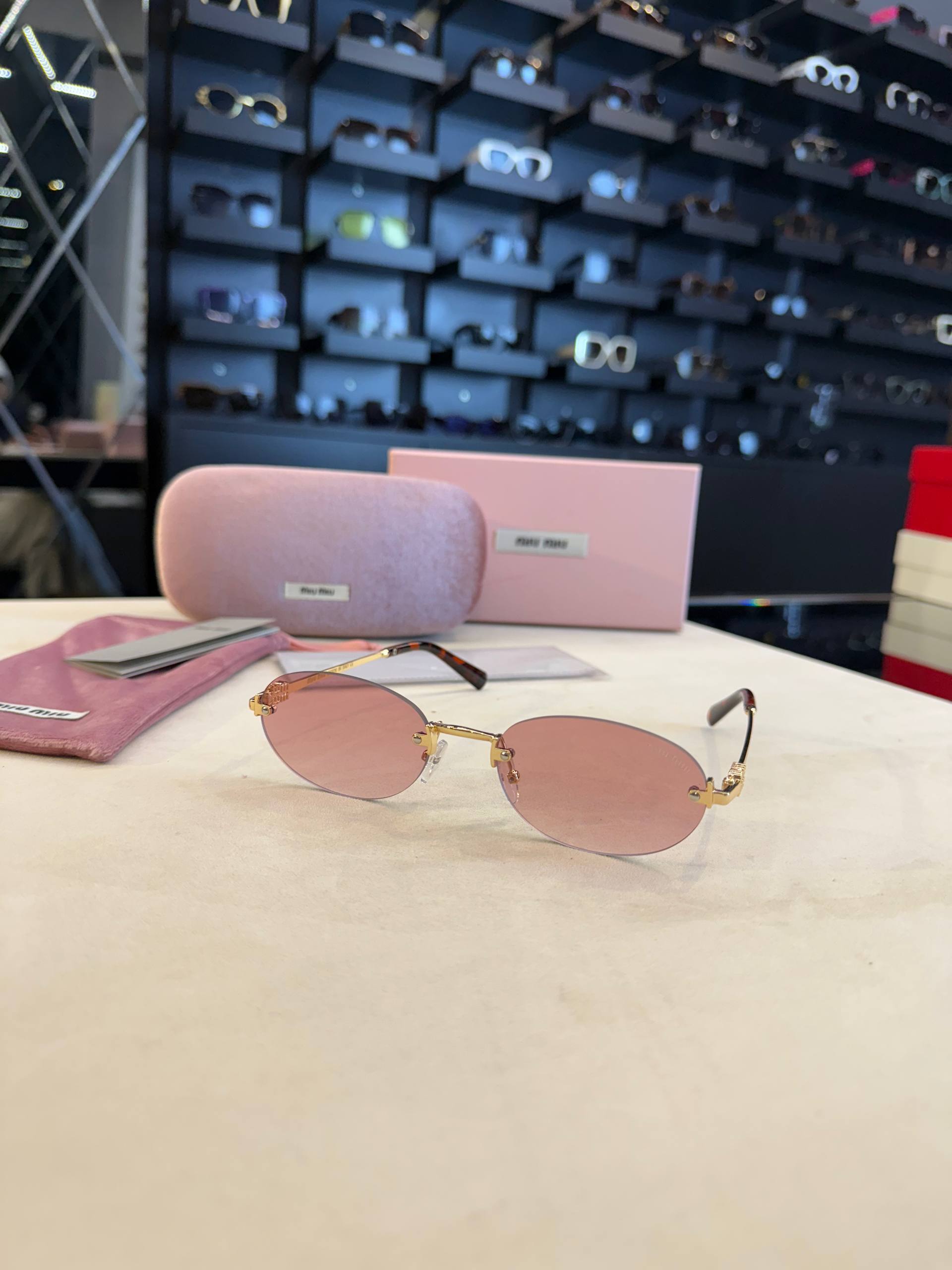 Miu Miu Rimless Oval