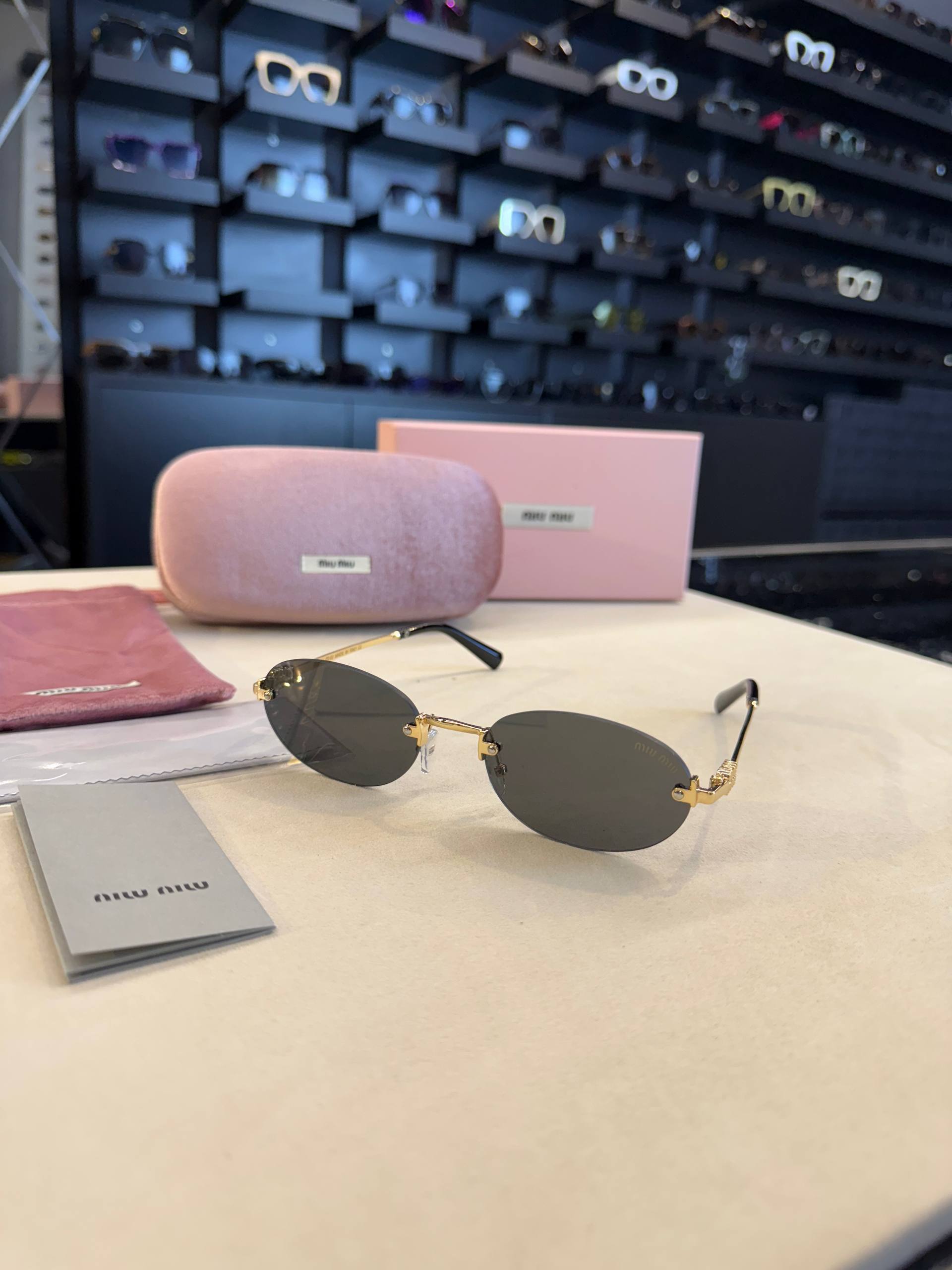 Miu Miu Rimless Oval