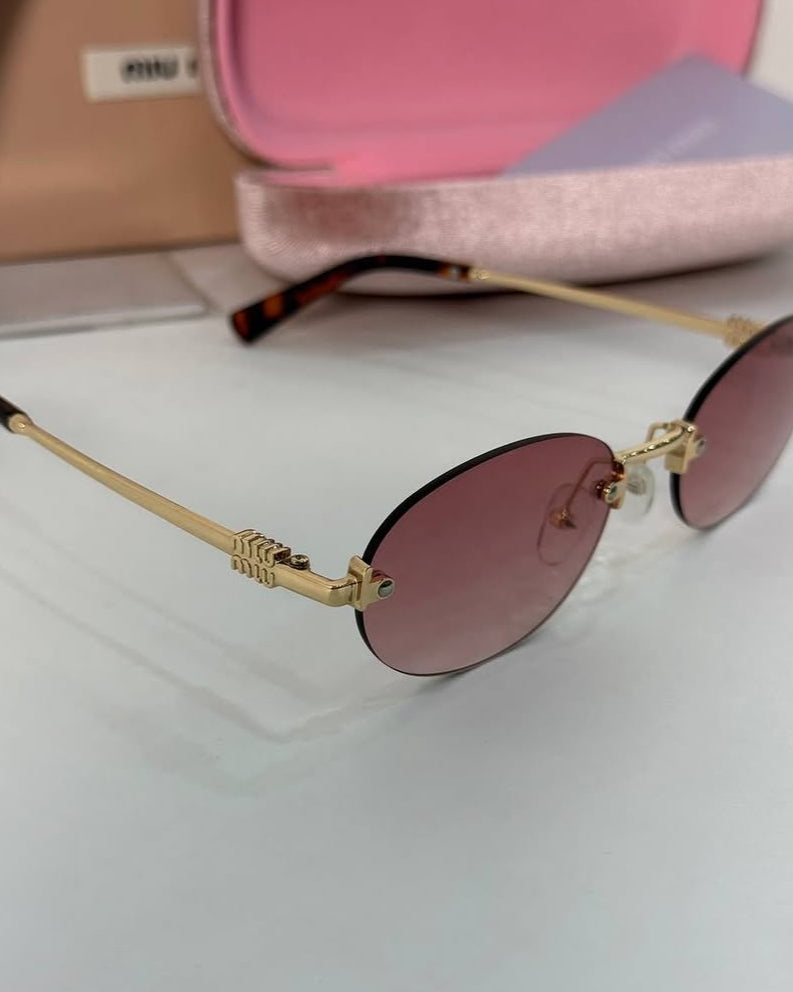 Miu Miu Rimless Oval