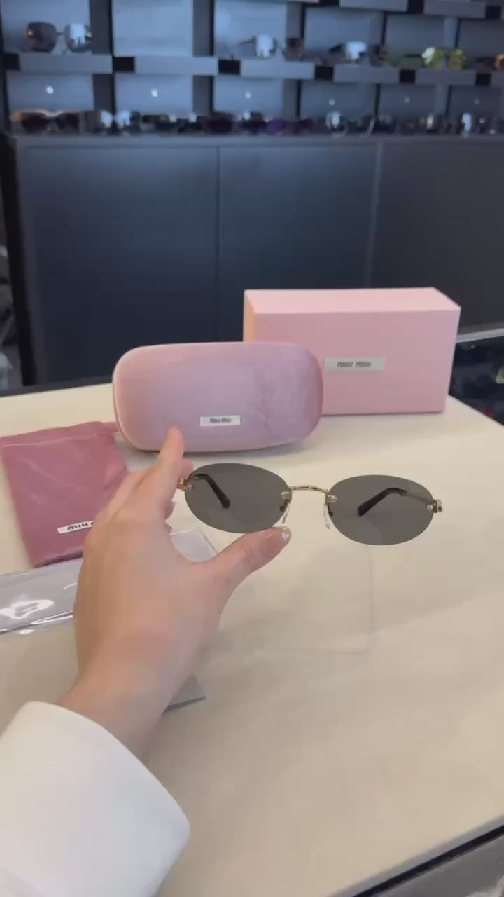 Miu Miu Rimless Oval